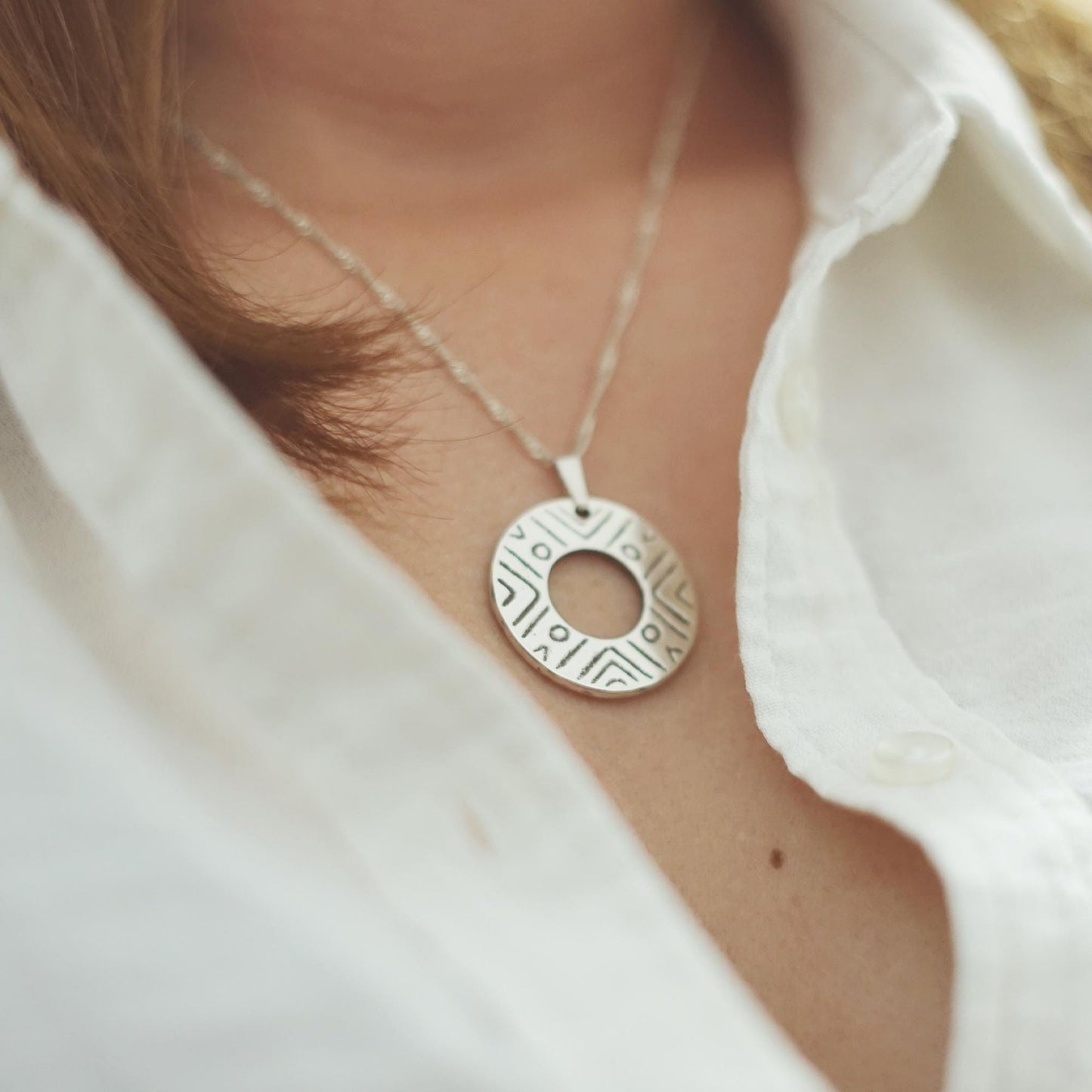 Sterling Silver donut shaped pendant with geometric pattern | Handmade circle necklace with ethnic design